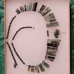 Green stone necklace 19-inch with beads and animal pendant